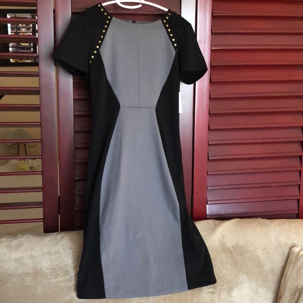 Black and grey sheath dress with grommet accents
